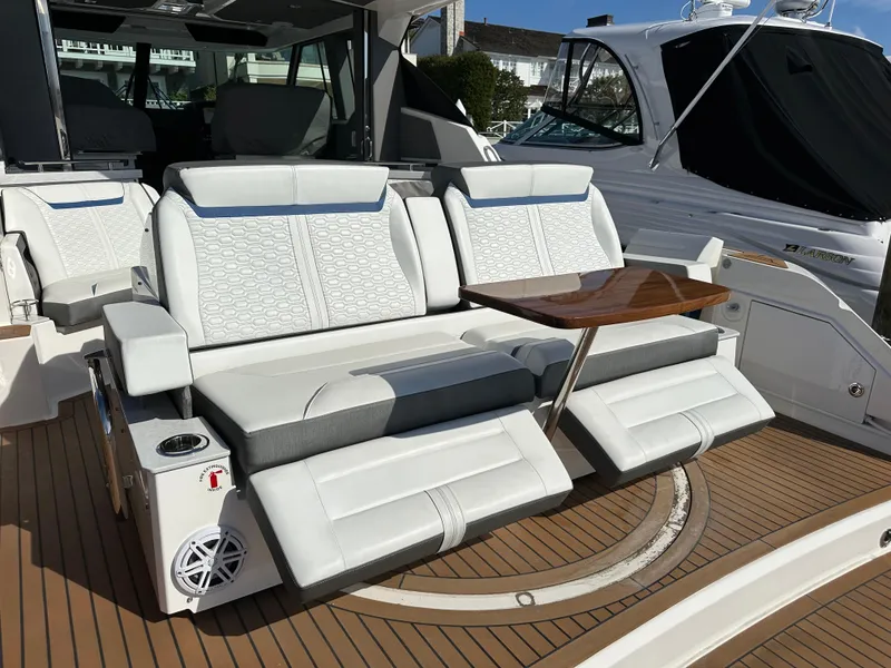 Slide: The Image of 360 degree spinning seat with leg rests and table - 11