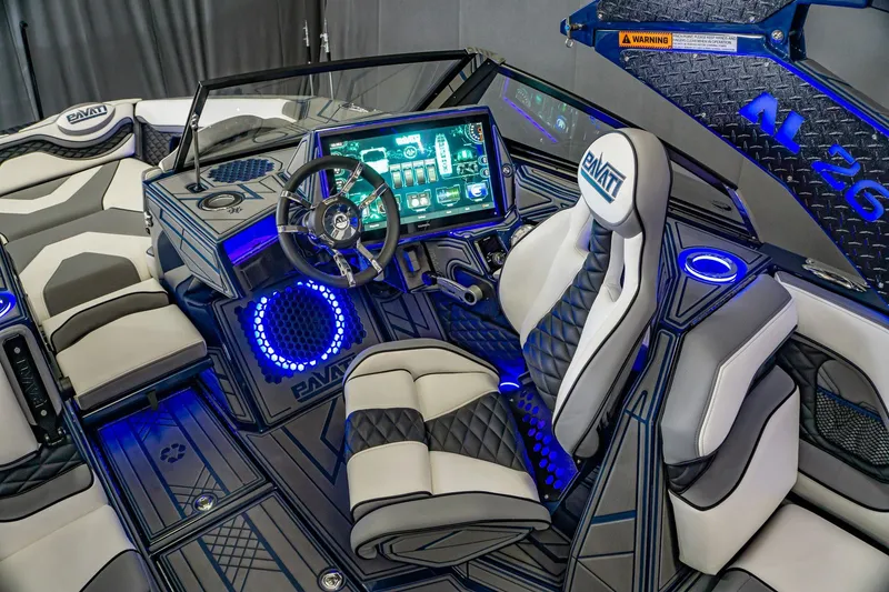Slide: The Image of 2021 Pavati AL26 boat interior with modern dashboard and illuminated controls. - 4
