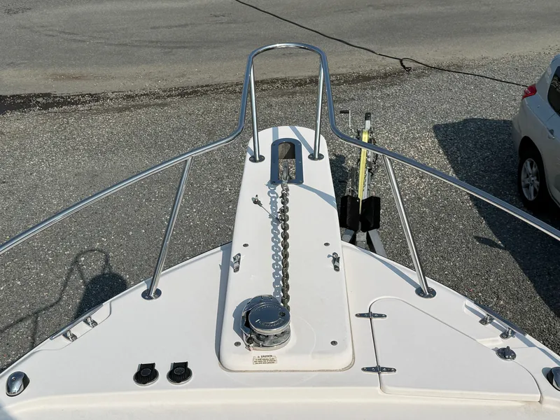 Slide: The Image of Bow of 2008 Grady-White 330 Express boat with anchor chain and railing. - 27