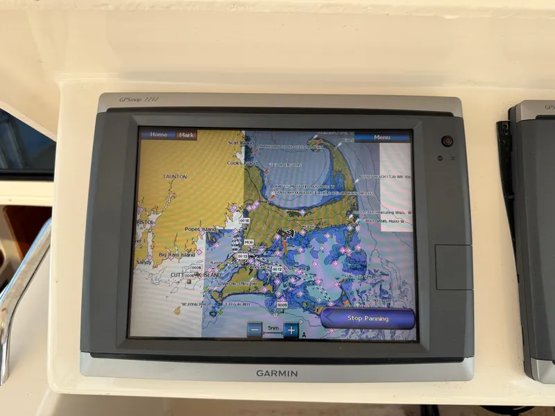 Slide: The Image of Garmin GPS display on 2008 Grady-White 330 Express boat, showing nautical map. - 41