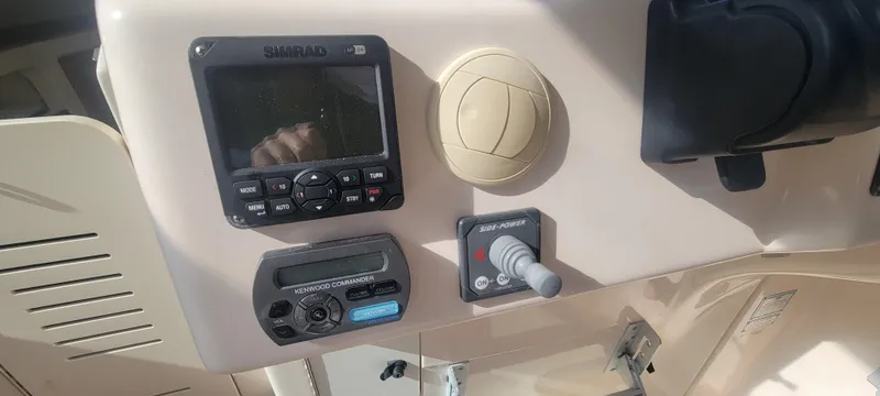 Slide: The Image of Control panel of 2008 Grady-White 330 Express boat with navigation equipment. - 6