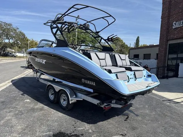 Slide: The Image of 2025 Yamaha Boats 255XD, powder blue, luxury interior, spacious seating, modern design. - 5
