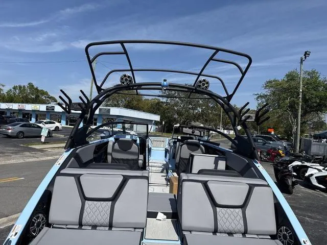 Slide: The Image of 2025 Yamaha Boats 255XD speaker detail under black canopy. - 8