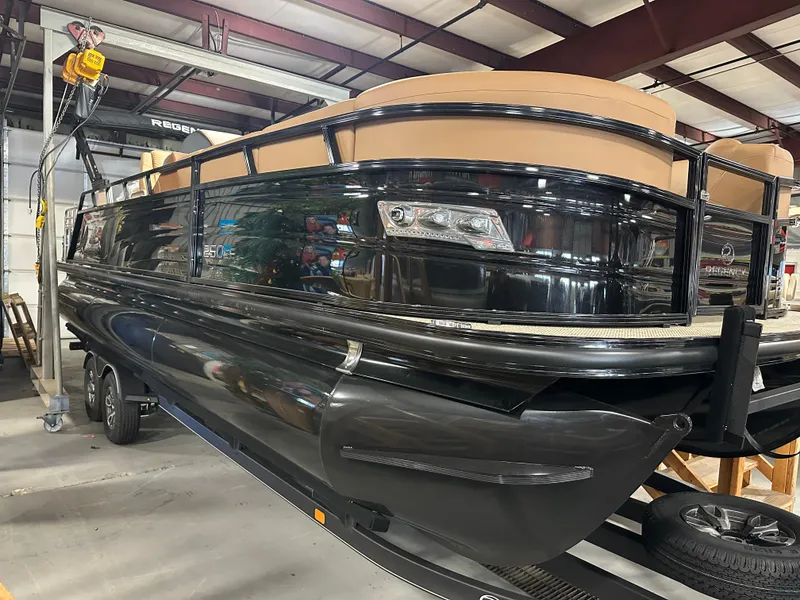 The Image of 2025 Regency 250 LE3 Sport pontoon boat in a showroom setting. - 0