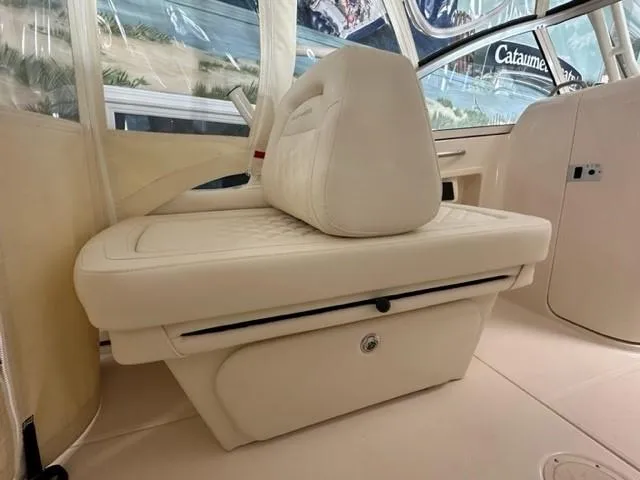 Slide: The Image of 2024 Grady-White 255 FREEDOM boat interior with plush seating and storage. - 15