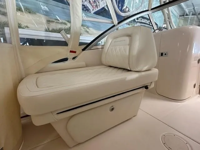 Slide: The Image of 2024 Grady-White 255 FREEDOM boat interior with luxurious seating and storage. - 16