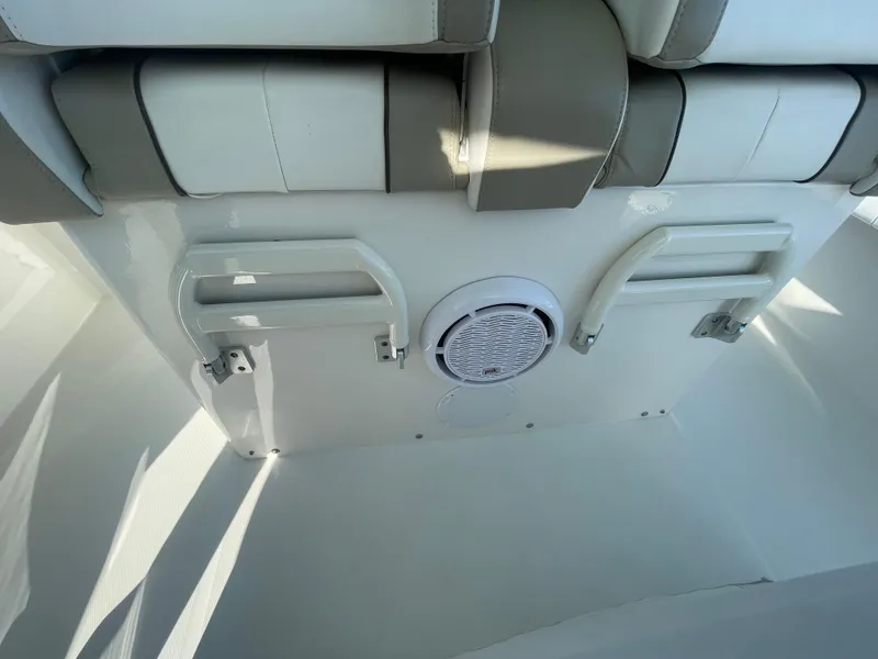 Slide: The Image of 2019 Regulator 34 boat interior with seating and speaker system. - 20