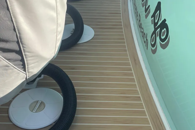 Slide: The Image of 2019 Regulator 34 boat deck with seating and ventilation hoses. - 31