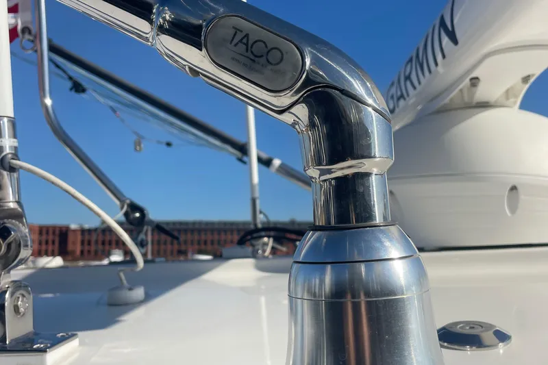 Slide: The Image of Close-up of a 2019 Regulator 34 boat's metal fittings under clear blue sky. - 35