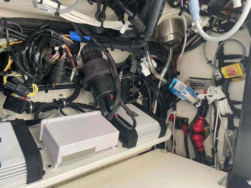 Slide: The Image of 2019 Regulator 34 boat wiring and components in engine compartment. - 8