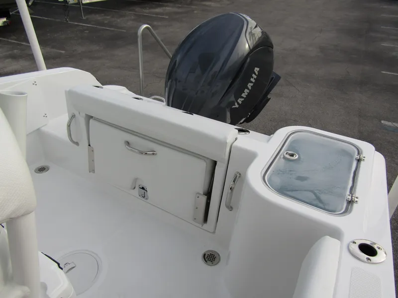 Slide: The Image of 2025 Wellcraft 223 Fisherman boat with Yamaha engine, featuring a clean deck layout. - 26