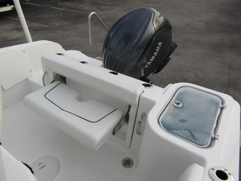 Slide: The Image of 2025 Wellcraft 223 Fisherman boat with Yamaha outboard motor and seating area. - 27