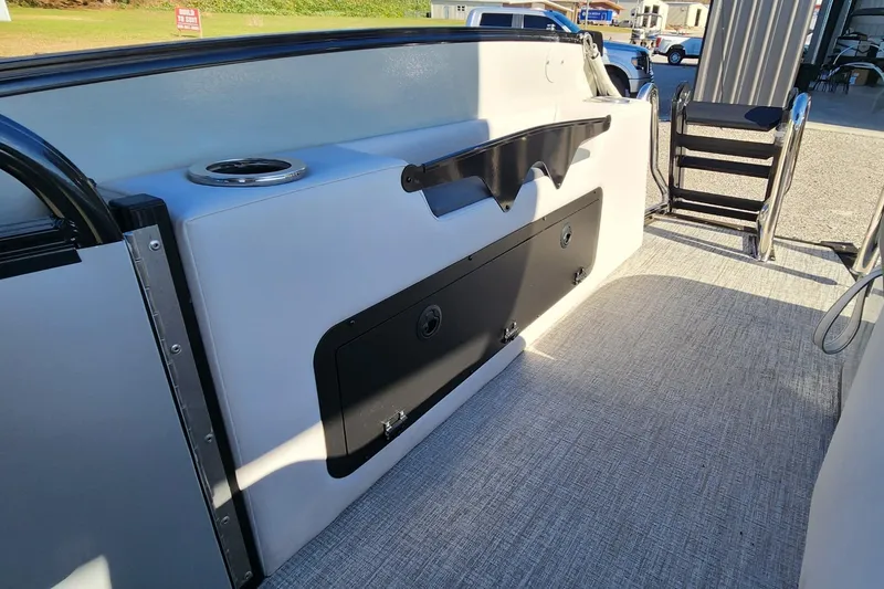 Slide: The Image of 2025 Avalon Platinum Catalina 2585 VRB interior with seating and storage compartments. - 10