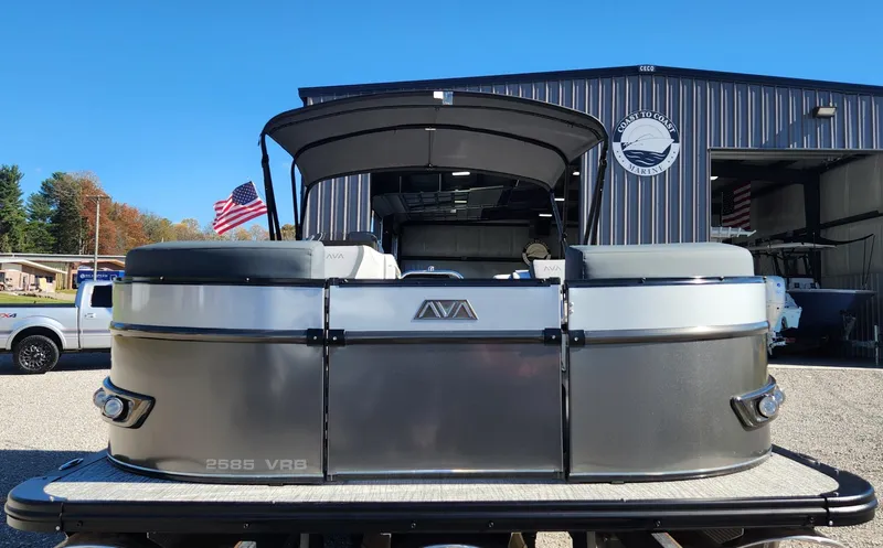 Slide: The Image of 2025 Avalon Platinum Catalina 2585 VRB pontoon boat at a dealership. - 2