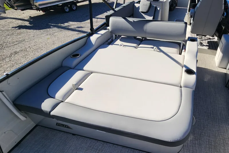Slide: The Image of 2025 Avalon Platinum Catalina 2585 VRB boat interior with spacious seating and cup holders. - 9
