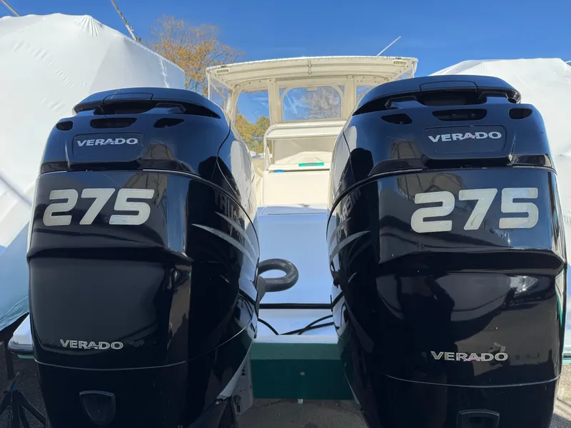Slide: The Image of Twin 275 Verado engines on a 1999 Marlin 350 SF boat. - 28
