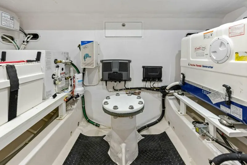 Slide: The Image of 2024 Valhalla V55 boat engine room with equipment and controls. - 38