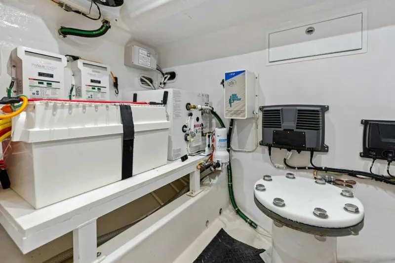 Slide: The Image of 2024 Valhalla V55 boat interior with electrical systems and equipment. - 39