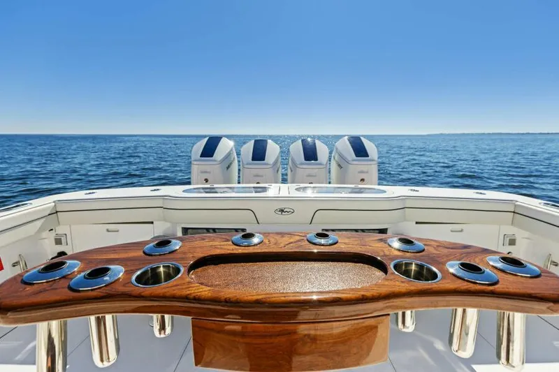 Slide: The Image of 2024 Valhalla Boatworks V55 with multiple outboard engines on open sea. - 4