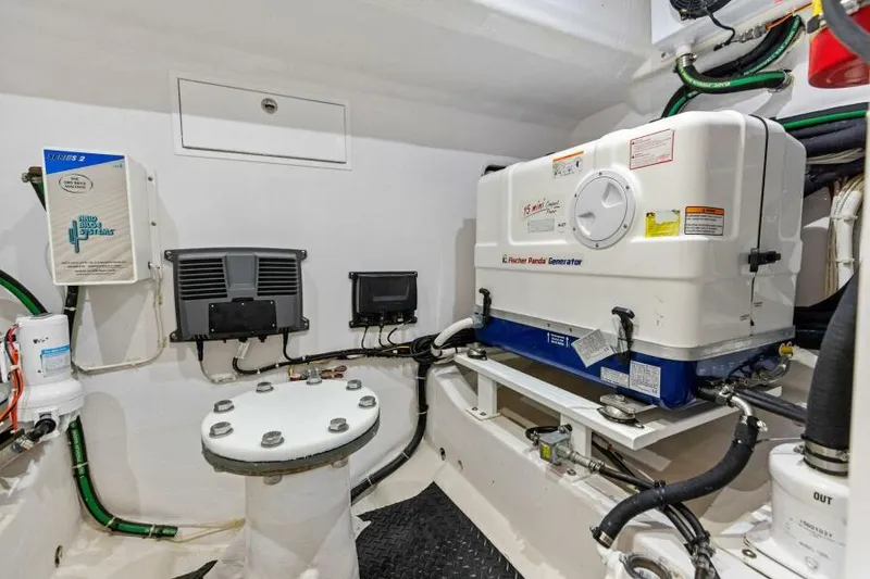 Slide: The Image of Engine room of 2024 Valhalla V55 boat with generator and control systems. - 40