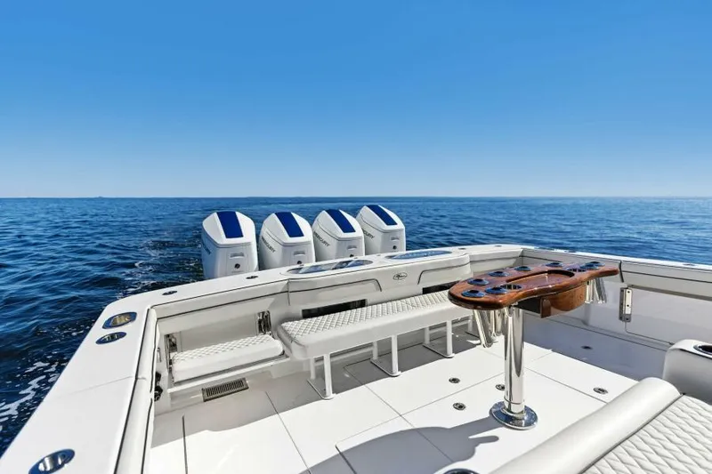 Slide: The Image of 2024 Valhalla V55 boat with quad engines on open sea. - 5