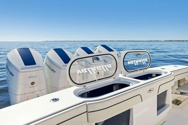 Slide: The Image of 2024 Valhalla V55 boat with Mercury engines on open water. - 8