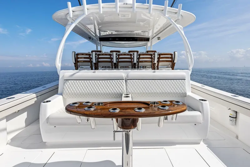 Slide: The Image of 2024 Valhalla V55 boat interior with seating and ocean view. - 9
