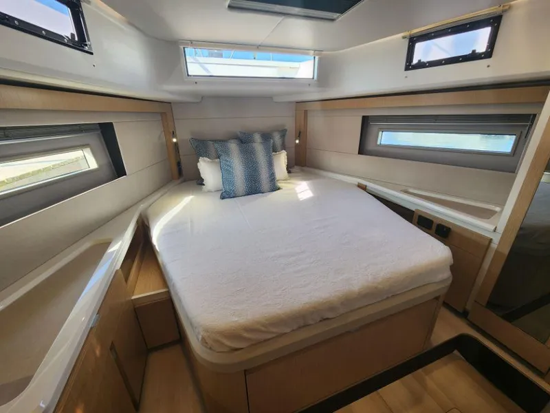 Slide: The Image of Luxurious cabin interior of 2025 Moody 48 DS yacht with modern design and natural light. - 40