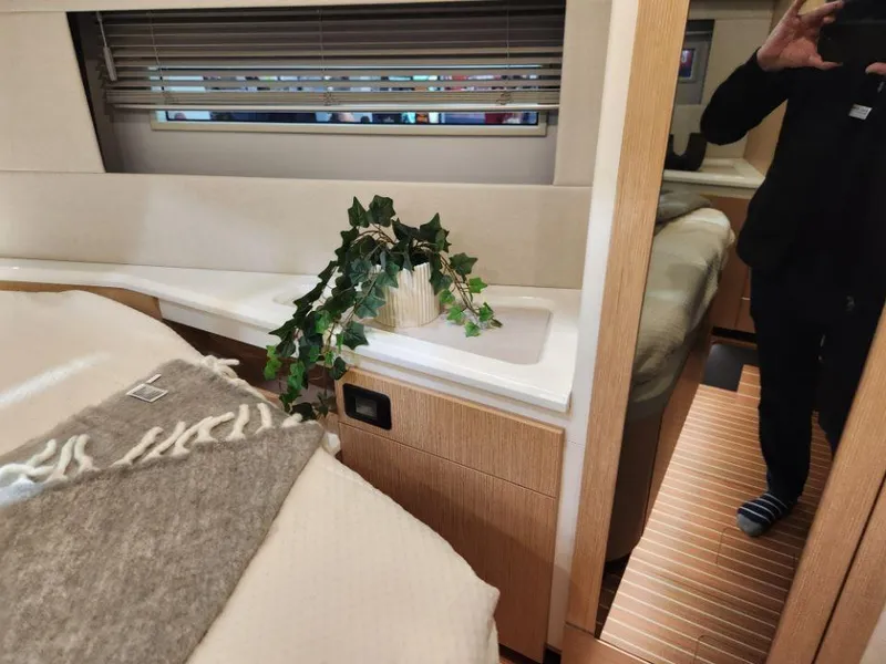 Slide: The Image of Luxurious interior of 2025 Moody 48 DS yacht with elegant decor and modern design. - 42