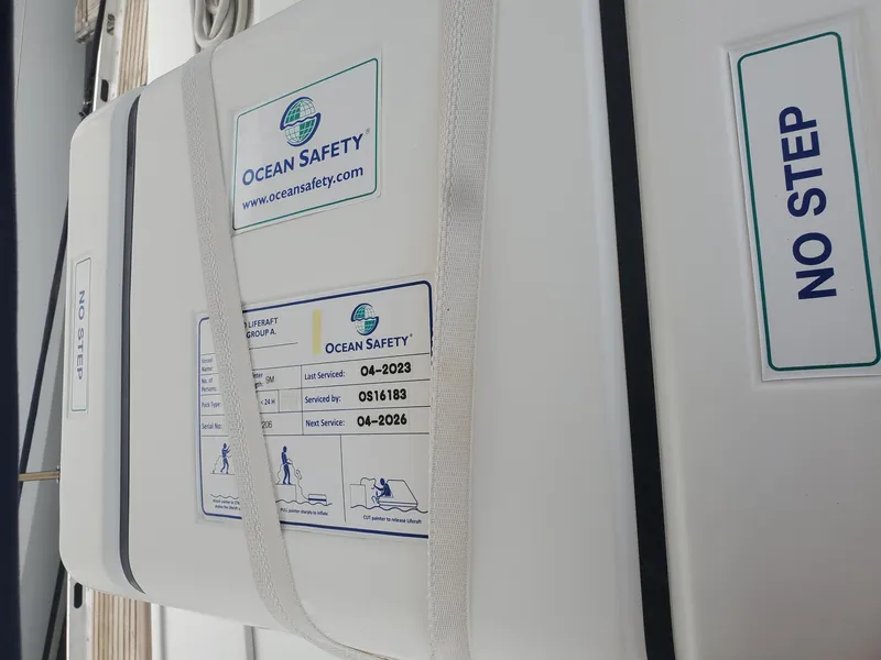 Slide: The Image of Ocean Safety equipment on 1984 Beneteau First 42 sailboat, labeled "NO STEP." - 19