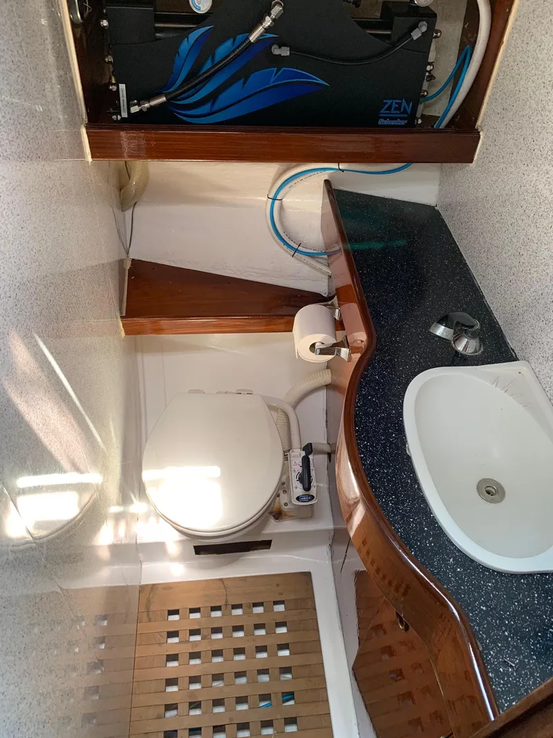 Slide: The Image of 1984 Beneteau First 42 yacht bathroom with sink and toilet. - 20