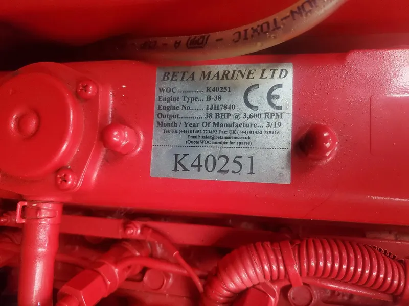 Slide: The Image of Beta Marine engine label on red machinery, Beneteau First 42, 1984 model. - 25