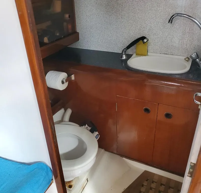 Slide: The Image of Beneteau First 42 yacht bathroom, 1984 model, featuring sink and toilet. - 29