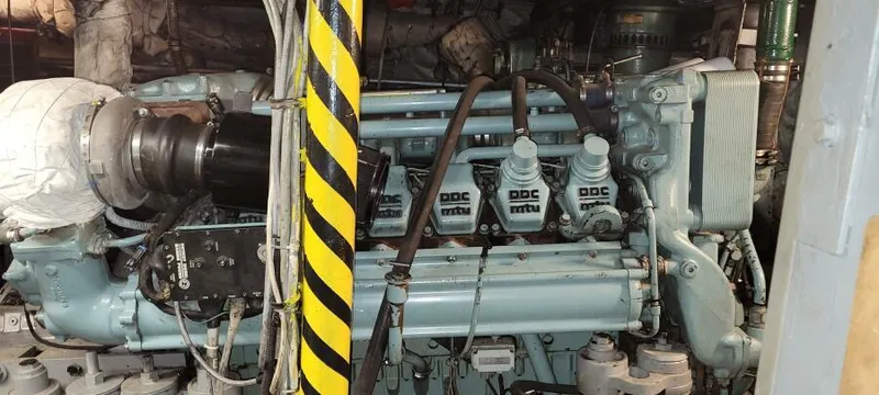 Slide: The Image of Engine room of 1979 Blount 130 Dinner Cruise vessel, featuring DDC MTU components. - 22