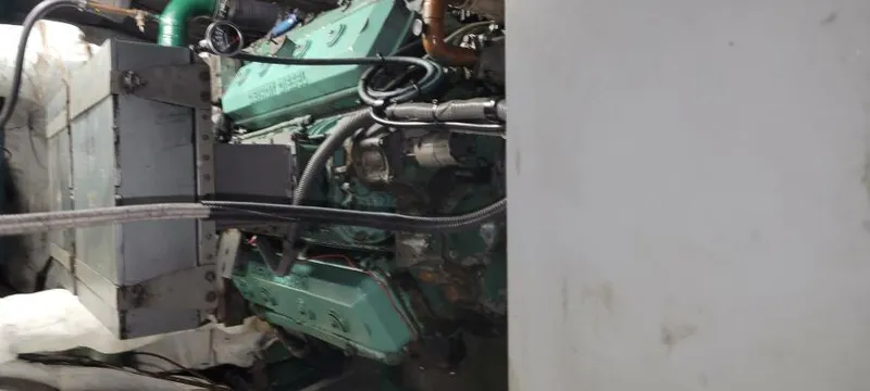 Slide: The Image of Engine room of 1979 Blount 130 Dinner Cruise ship, featuring mechanical components and wiring. - 26