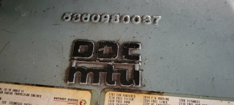 Slide: The Image of Close-up of a Blount 130 Dinner Cruise engine part with serial number and DDC MTU logo. - 27