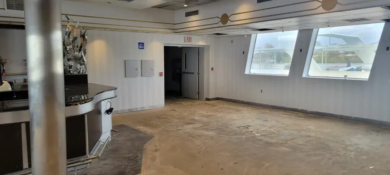 Slide: The Image of Empty room with large windows and a bar, Custom Victory 11, 1981. - 12