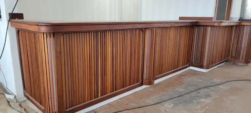 Slide: The Image of Wooden bar counter with vertical slats, Custom Victory 11, 1981 design. - 14