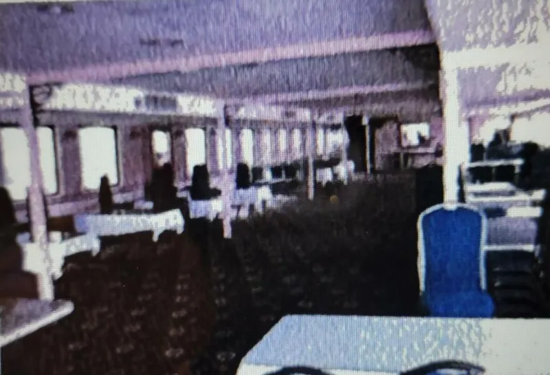 Slide: The Image of Spacious interior of a 1985 custom dinner excursion passenger vessel with tables and chairs. - 12
