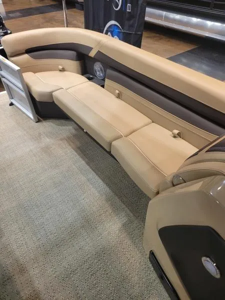 Slide: The Image of 2025 Barletta C24U boat interior with beige seating and modern design. - 12