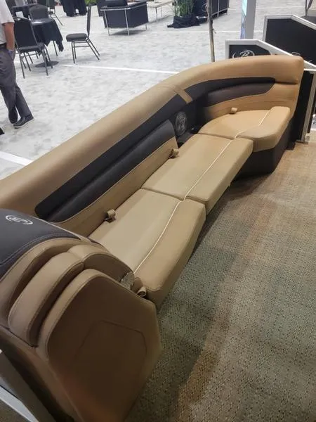Slide: The Image of 2025 Barletta C24U boat interior seating, beige and black upholstery, modern design. - 19