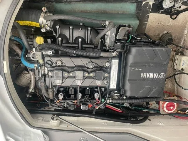 Slide: The Image of Engine compartment of a 2016 Carbon Craft CC 160 with Yamaha components. - 8