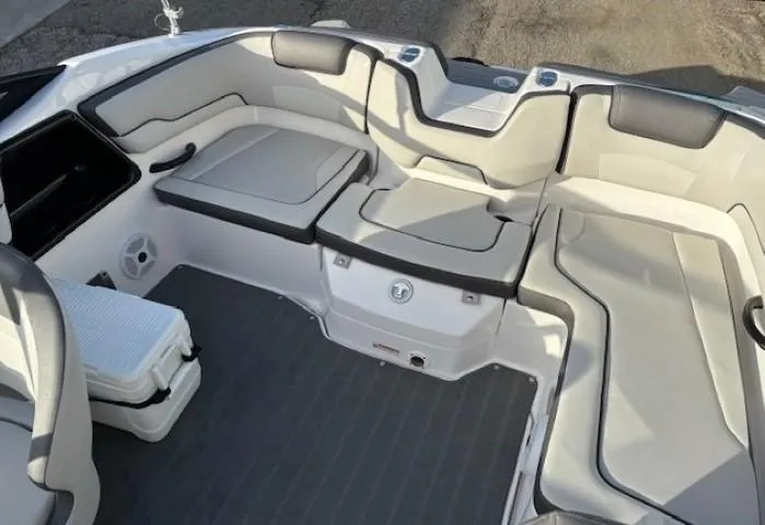 Slide: The Image of 2020 Yamaha Boats SX190 interior with spacious seating and modern design. - 21