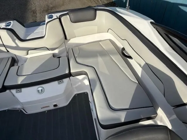 Slide: The Image of 2020 Yamaha Boats SX190 interior seating with sleek, modern design and comfortable upholstery. - 22