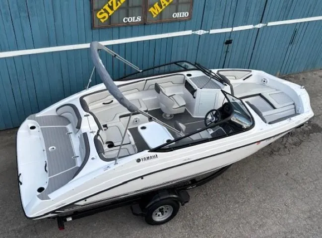 Slide: The Image of 2020 Yamaha SX190 boat, white exterior, parked on trailer, viewed from above. - 6