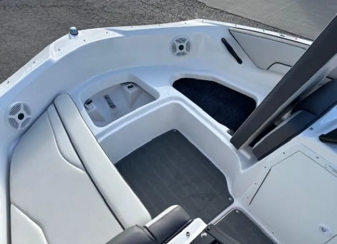 Slide: The Image of 2020 Yamaha Boats SX190 interior seating and storage area. - 8