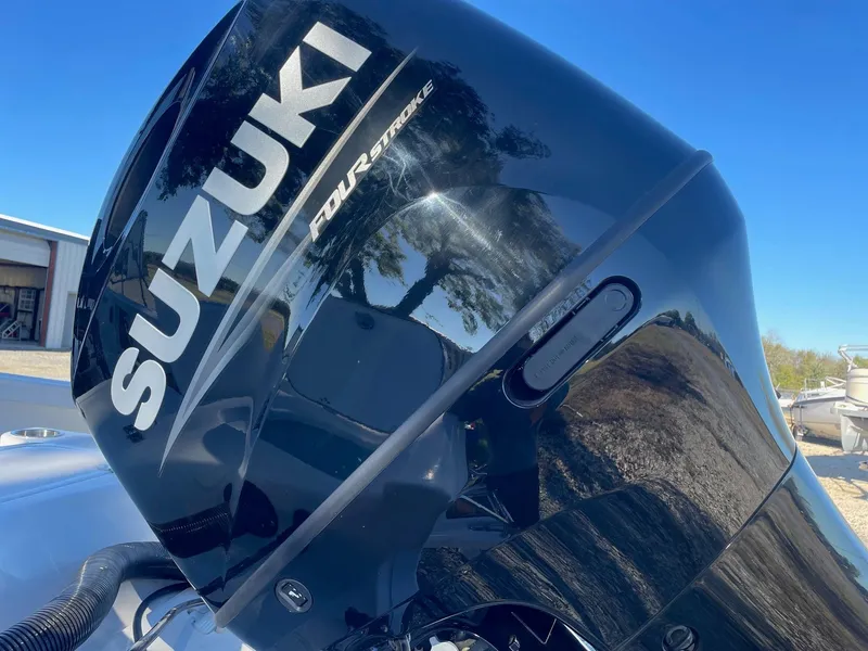Slide: The Image of Suzuki Four Stroke engine on 2025 Sea Pro 210 DLX boat. - 23