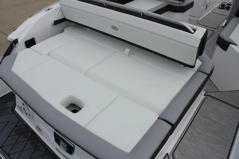 Slide: The Image of 2024 Cobalt R6 boat with white cushioned seating and sleek design. - 17