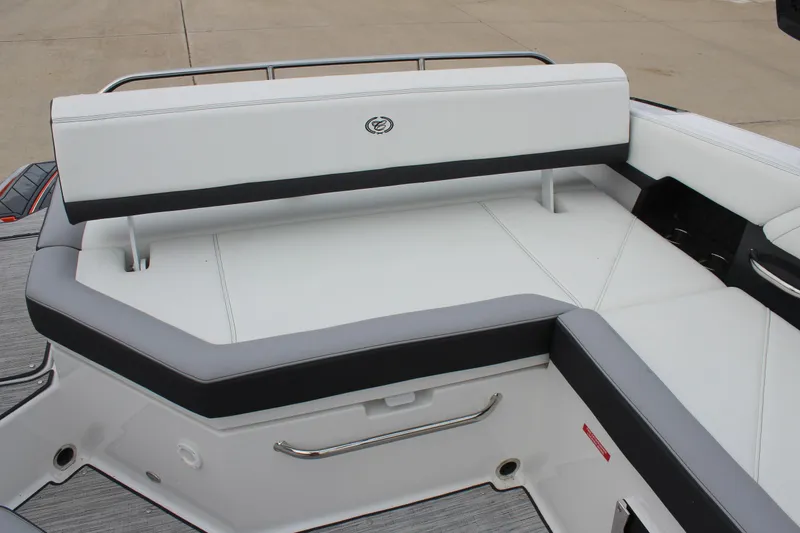 Slide: The Image of 2024 Cobalt R6 boat interior with white and gray seating. - 20