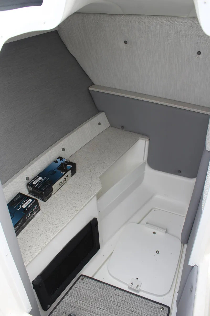 Slide: The Image of 2024 Cobalt R6 cabin interior with storage and seating area. - 27